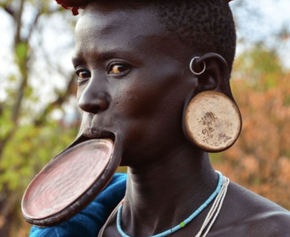 HOW-ANCIENT-TRIBES-USES-ELONGATING-STRETCHING-TECHNIQUES-TO-GROW-BIGGER-SEE-HERE-LIP-DISK-EAR-LOBE-STRETCHED-ELONGATED-METHODS-ALFA-STALLION